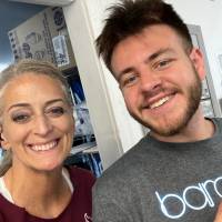 2 people outside the store
