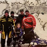 Trophy winner of a snowmobile competition